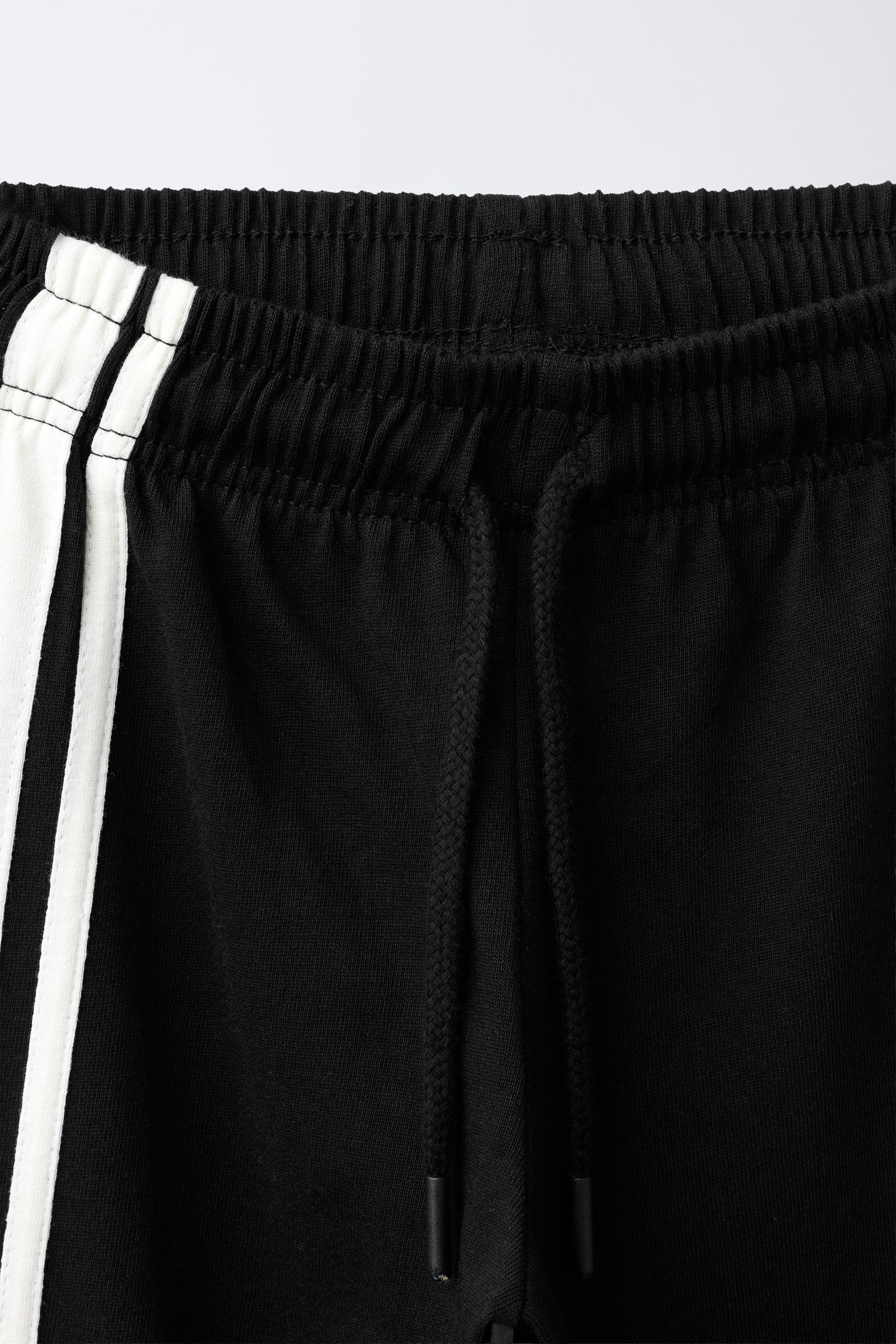 WIDE LEG PANTS WITH SIDE STRIPES